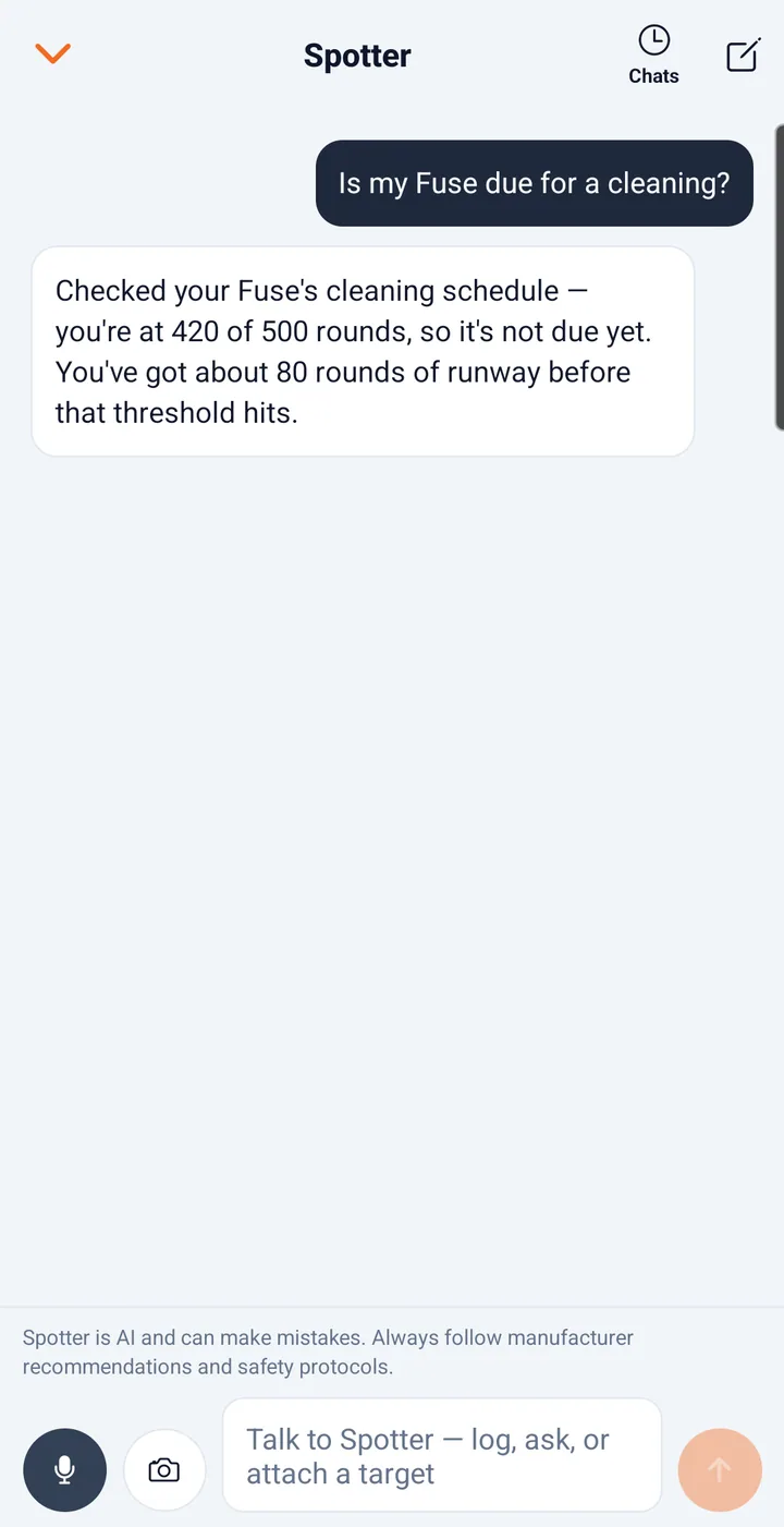 A Spotter conversation in a demo account. Asked if a firearm is due for cleaning, Spotter answers from its saved round count and maintenance threshold.